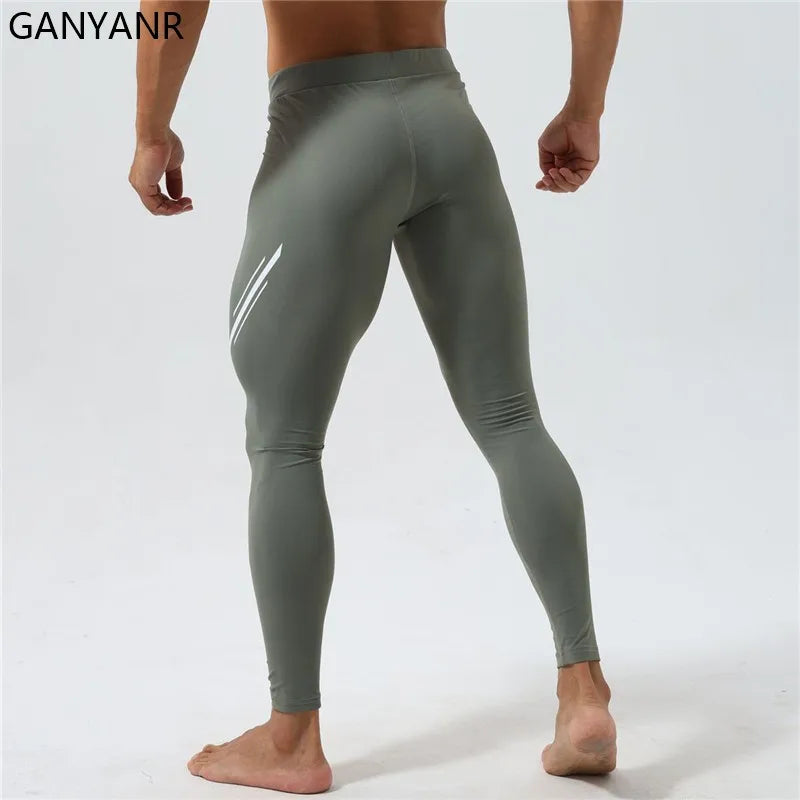 GANYANR Running Tights Men Fitness Training Track Suit Compression With Pockets winter Legging Cargo pants Sports gym 2in1 sport